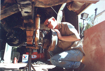 Willie painting the back of the brake drum.